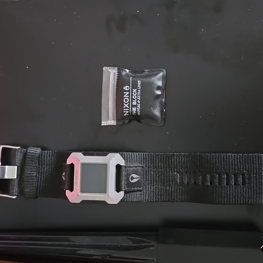 Nixon Black and Silver Digital Watch